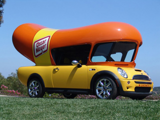 Illustration for article titled Ten-Pack Of Dogs: History Of The Wienermobile